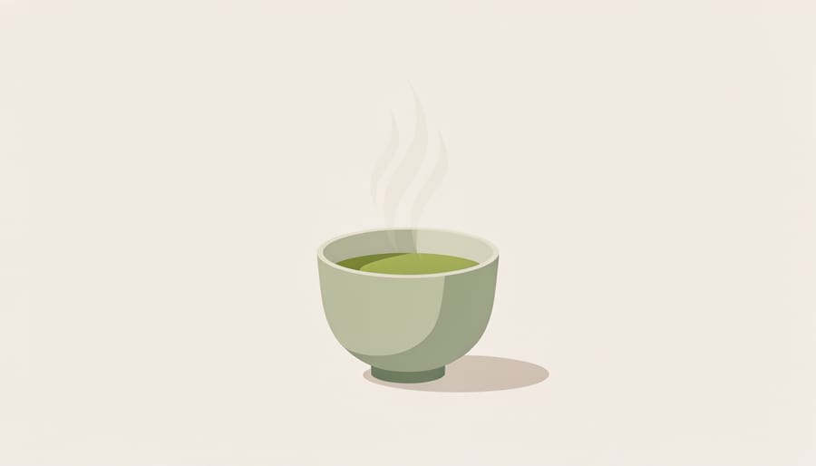 Person sitting quietly with a steaming cup of matcha at a tidy table, journal and greenery softly blurred in the background